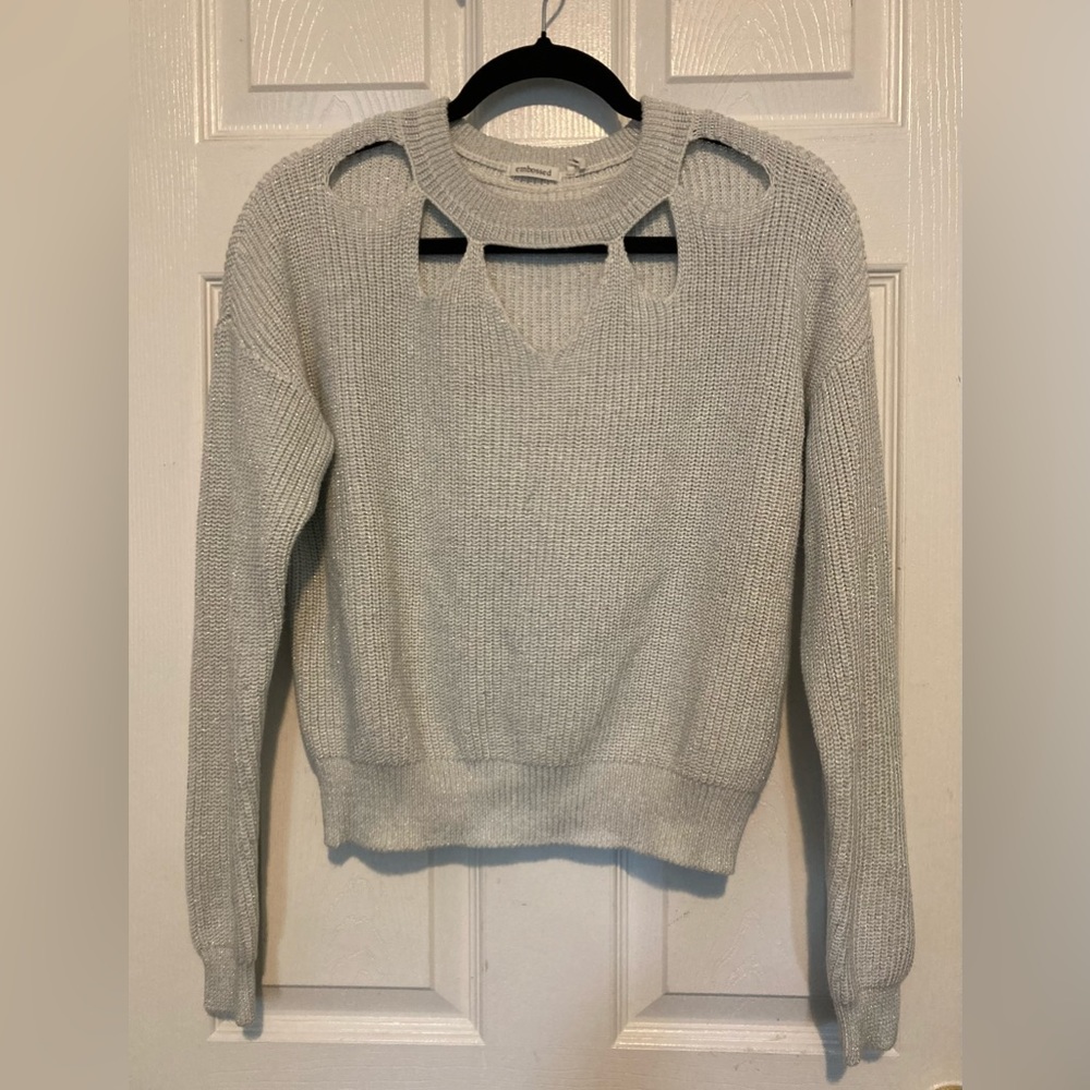 EUC Embossed size large ribbed metallic knit sweater. Peekaboo cutouts